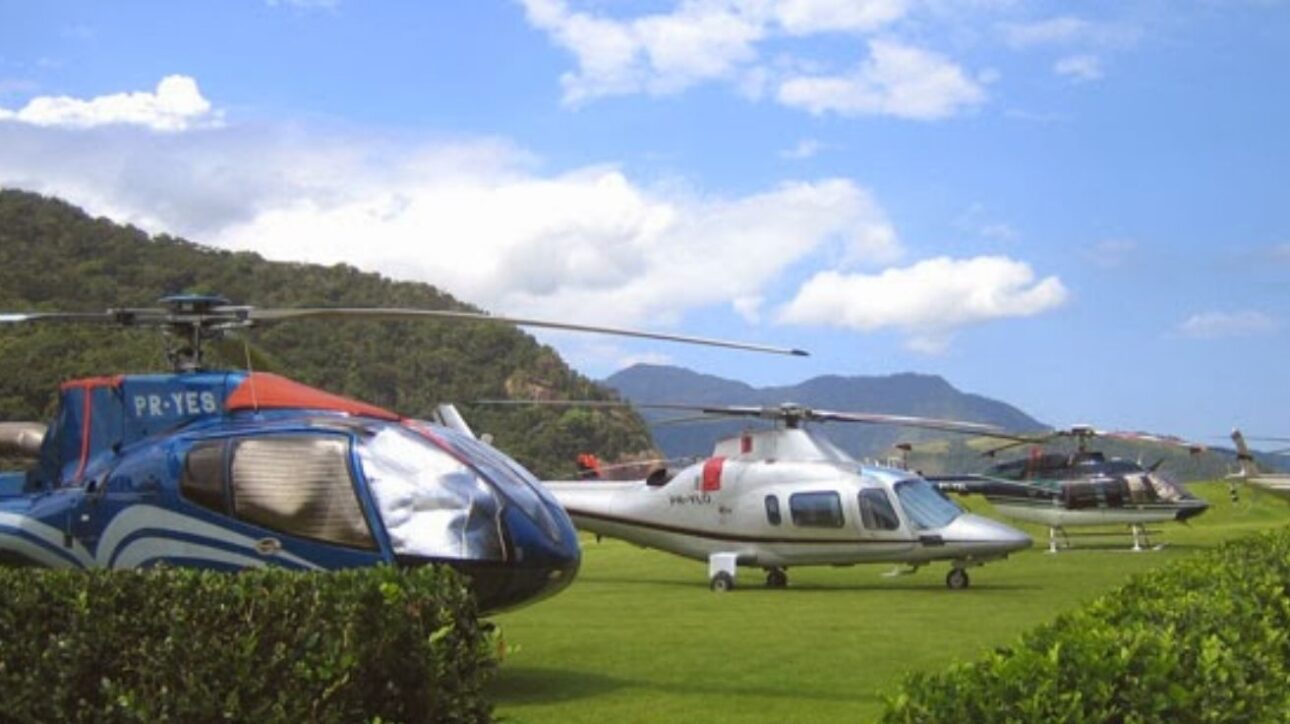 Condomínio de bilionários em Paraty se torna rota líder para voos de helicópteros. Saiba como a Revo conecta luxo e mobilidade aérea no litoral.