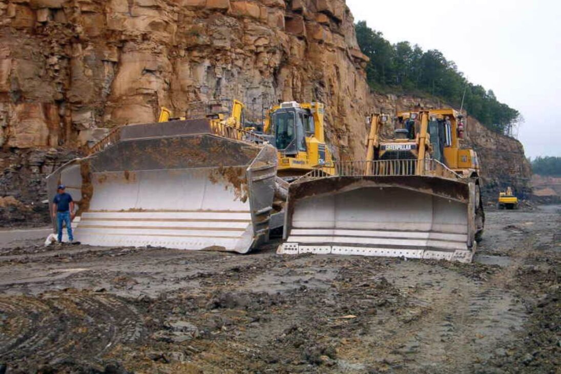 Komatsu D575A‑3 Super Dozer pushes the equivalent of a small