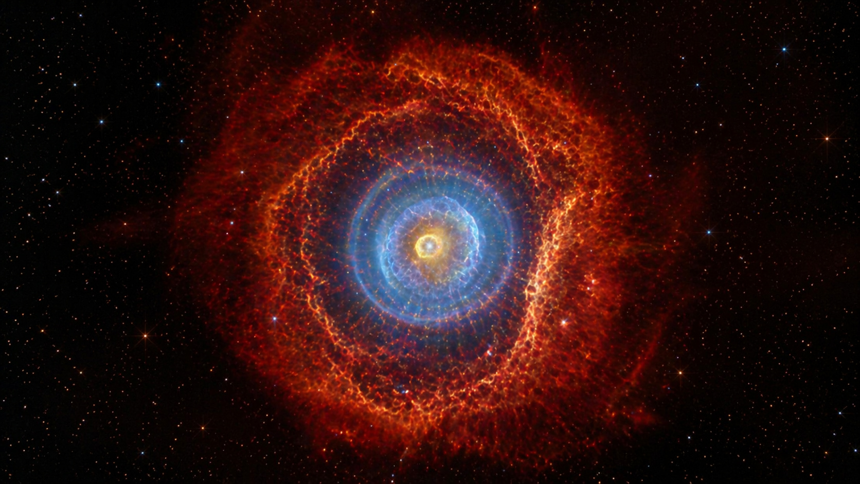 Nebulosa espacial com buckyballs e estruturas coloridas captadas pelo telescópio James Webb
