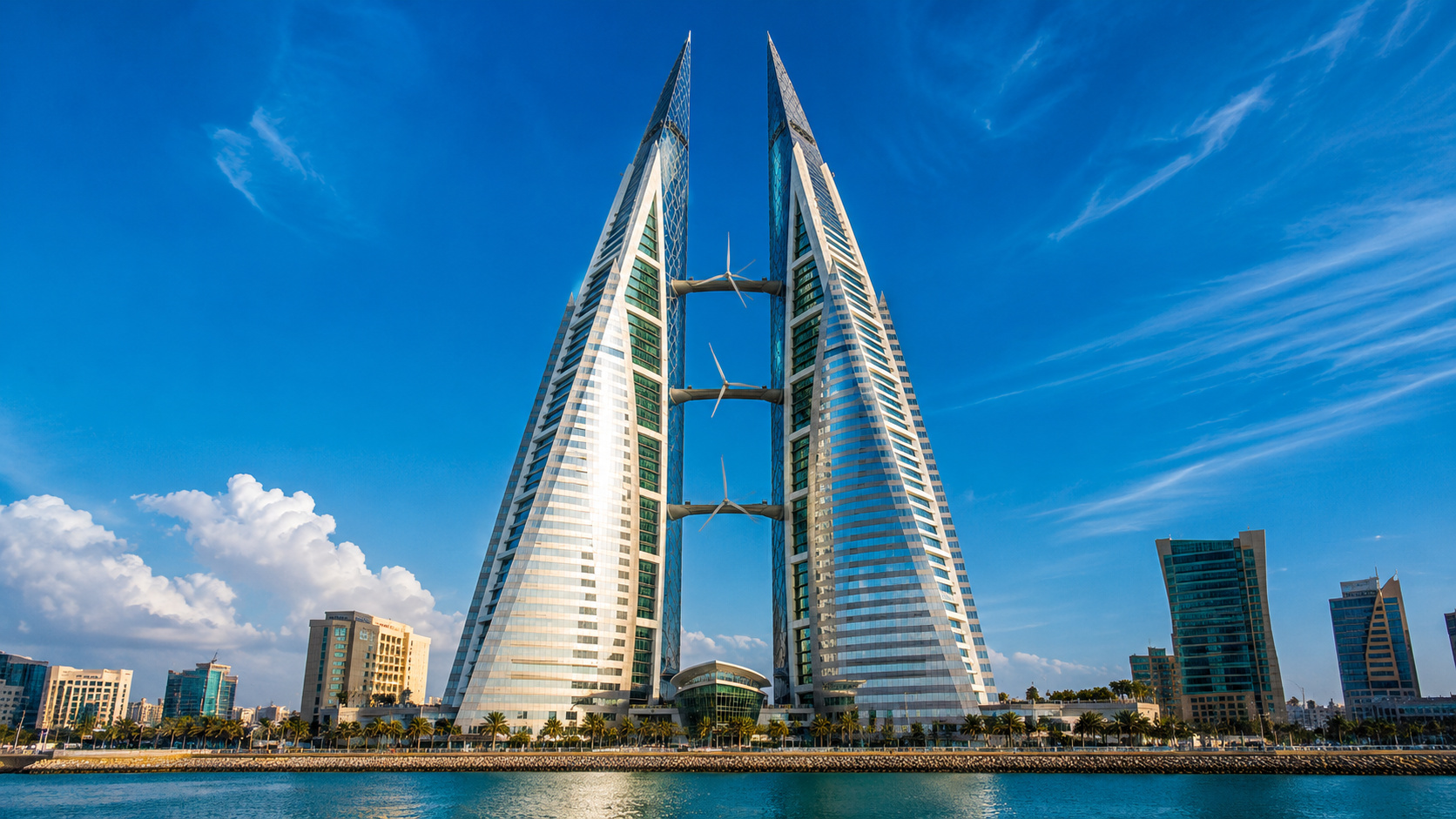 no Bahrein três hélices foram presas entre duas torres de 240 metros para transformar vento urbano em energia