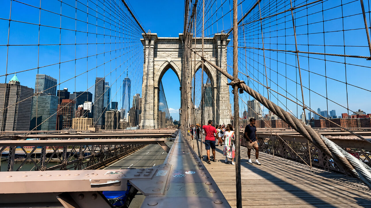 The bridge connected Manhattan to Brooklyn and was completed in 1883, after 14 years of construction.