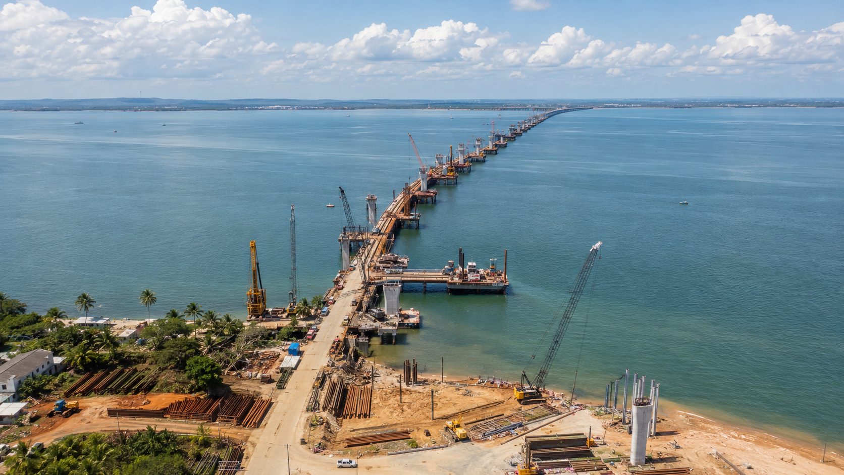 Construção ilustrativa da Ponte Salvador-Itaparica sobre a Baía de Todos-os-Santos, com guindastes, plataformas de apoio e canteiros de obra próximos ao litoral.