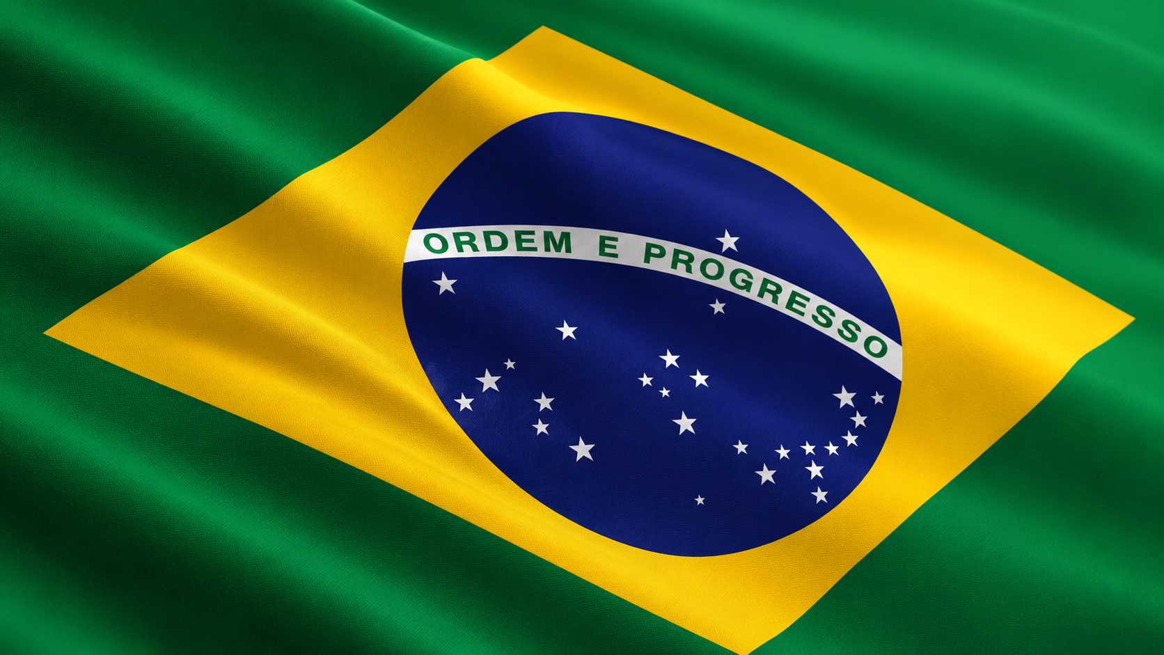 Bandeira do Brasil em movimento representa a história da introdução cantada do Hino Nacional Brasileiro.