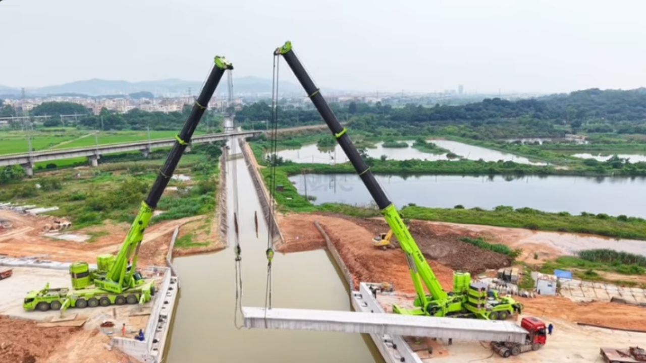 China instala puente en 24 horas con grúas Zoomlion, vigas de 125 toneladas y convoy nocturno en operación sobre río.