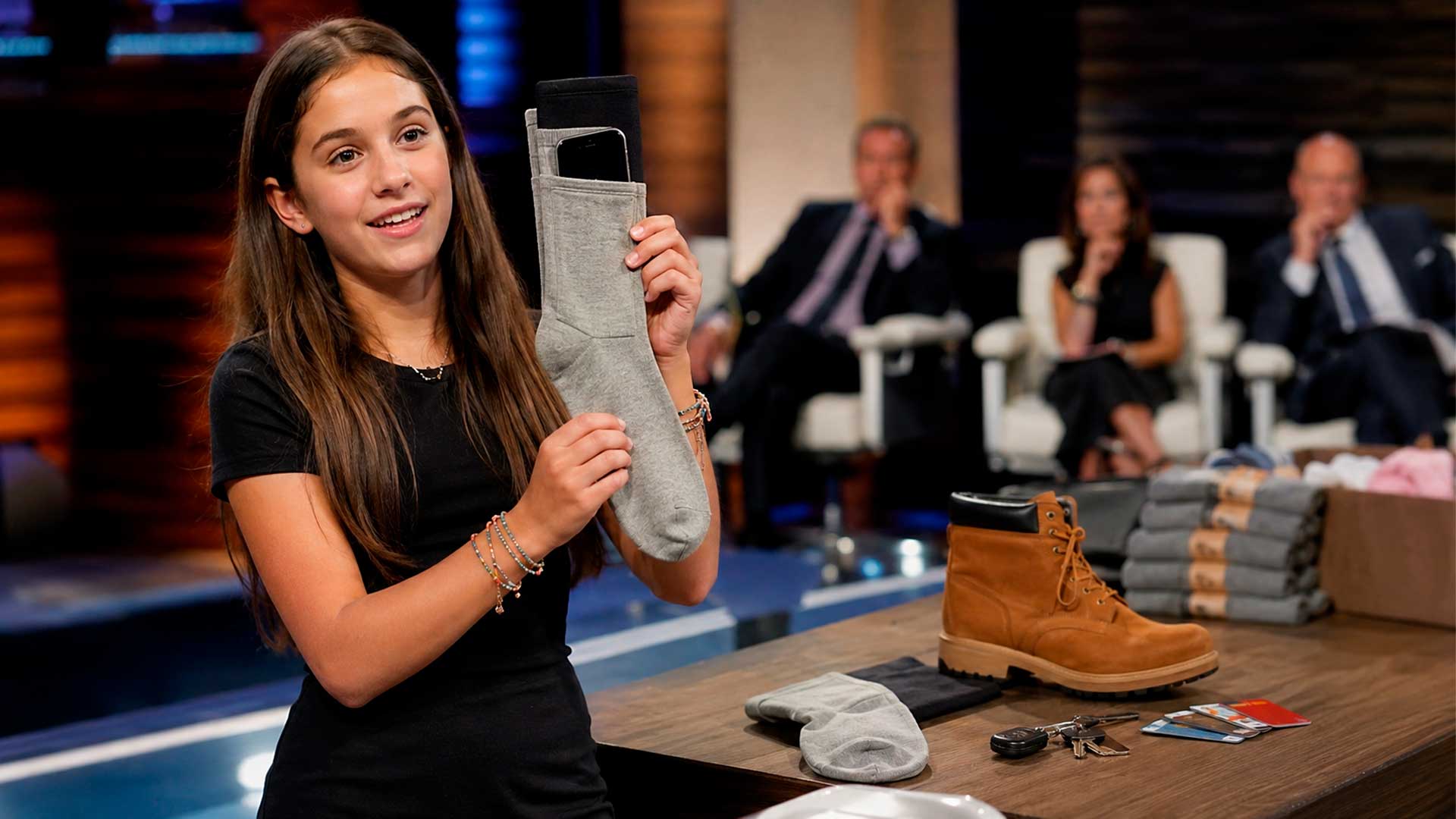 Jovem de 14 anos criou meias com bolso para celular, fechou acordo no Shark Tank e passou a doar pares para crianças vulneráveis