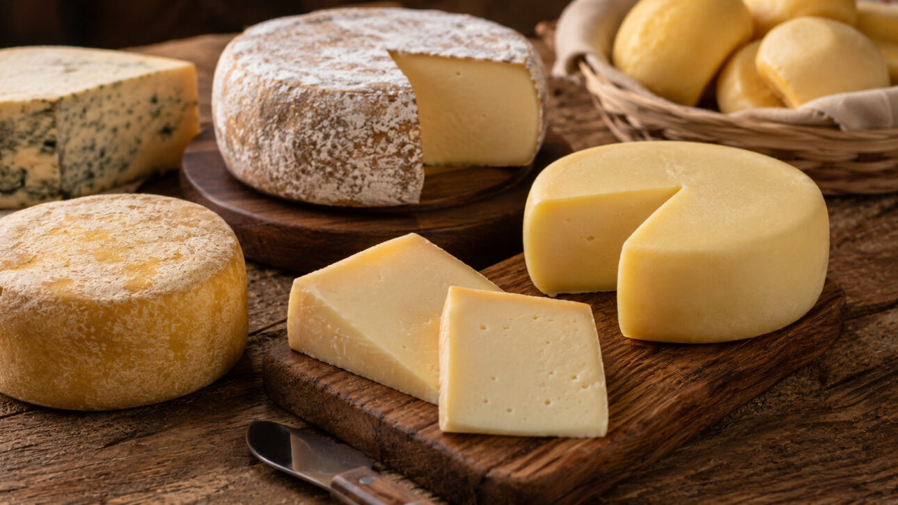 Rustic table of artisanal cheeses