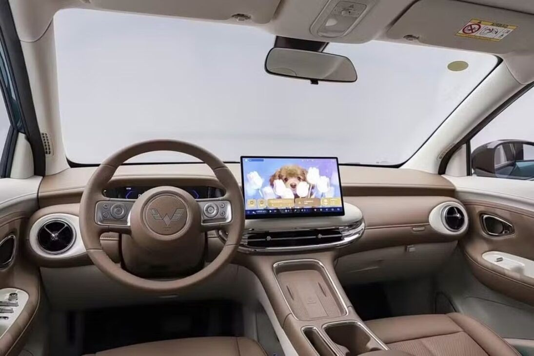 Cabin of the Wuling Bingo Pro shows digital dashboard and modern finish in a potential Chevrolet electric hatch.