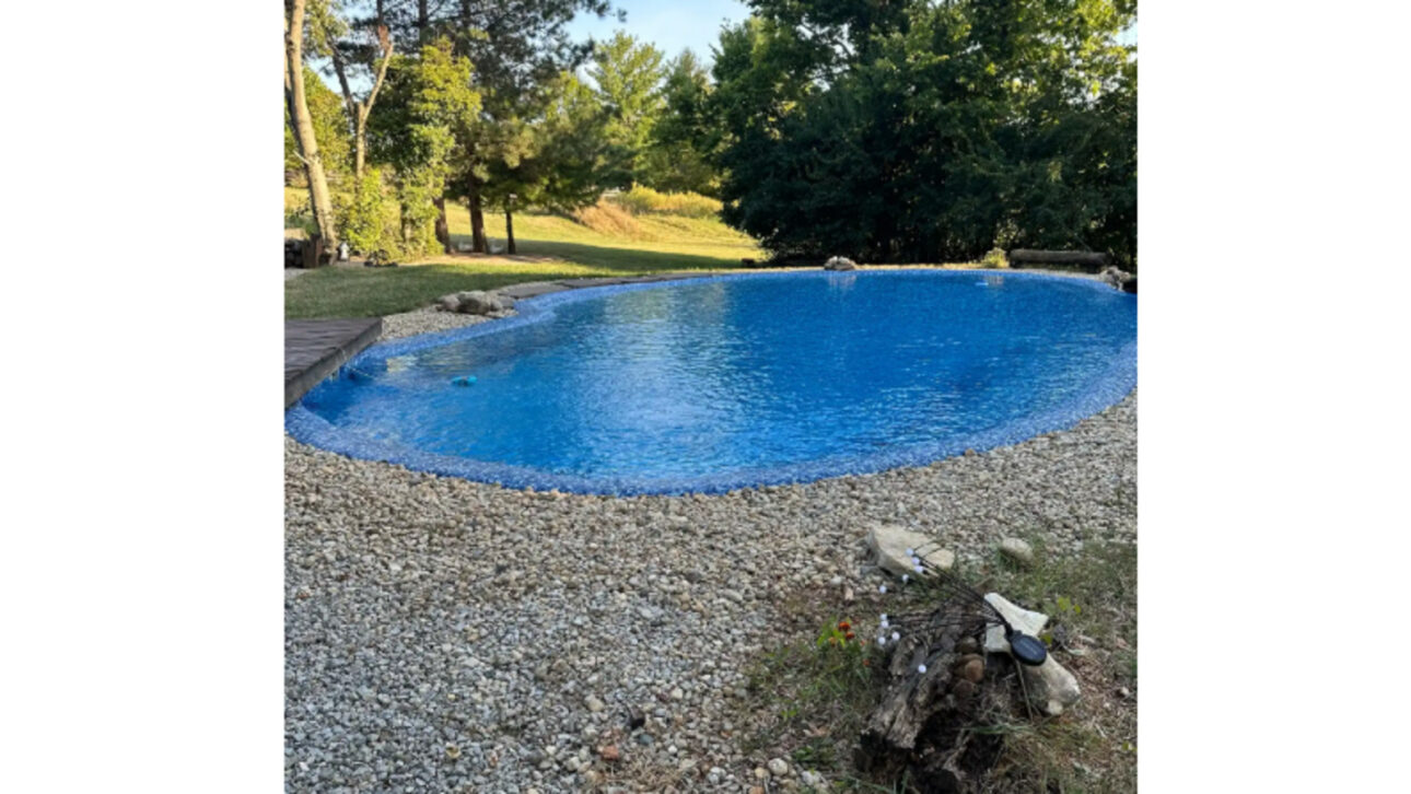 Woman receives a $25,000 quote, uses pond liner and old materials to build her own in-ground pool for less than $2,000, saving over $23,000