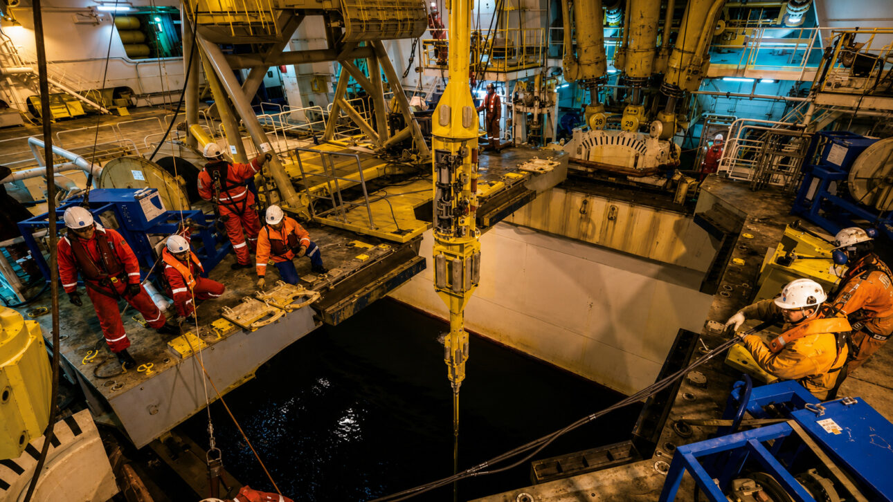 The scientific drilling ship Chikyu gathers tower, laboratories, and vertical pipes to reach very deep rocks under the sea