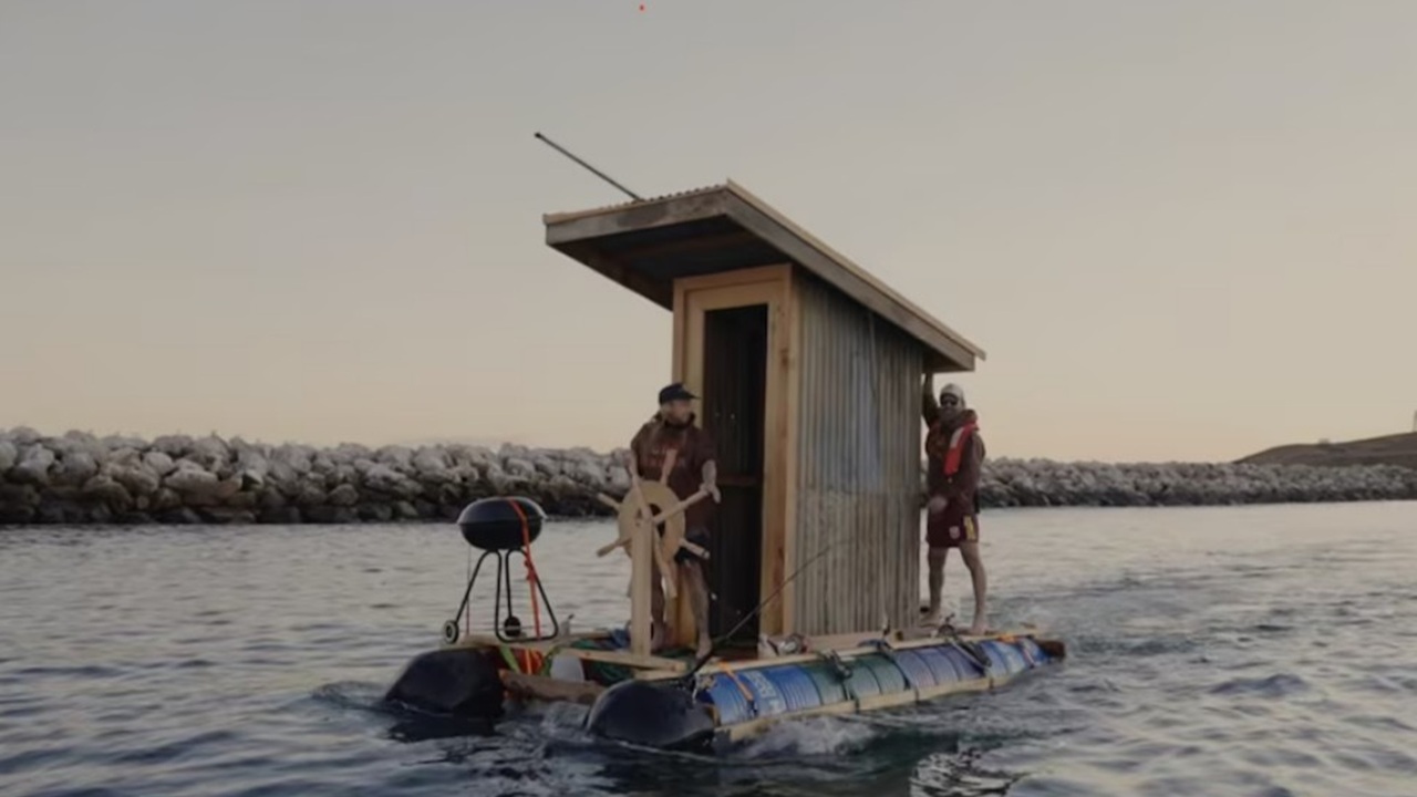 Alex Craig and Paul Graham built their own vessel to transport a bathroom to Kangaroo Island.
Photo: Mr Boat Ramp