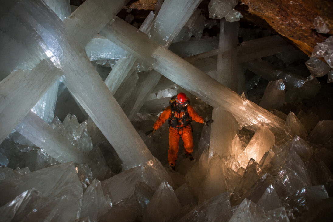 The Naica Crystal Cave in Mexico houses gypsum giants up to 11 meters and an extreme environment of almost lethal heat and humidity.