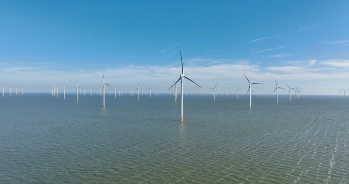 Parque de energia eólica offshore com várias turbinas no mar