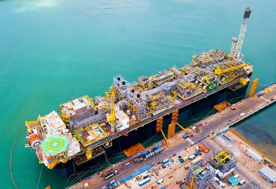 Aerial view of floating oil production platform in coastal waters