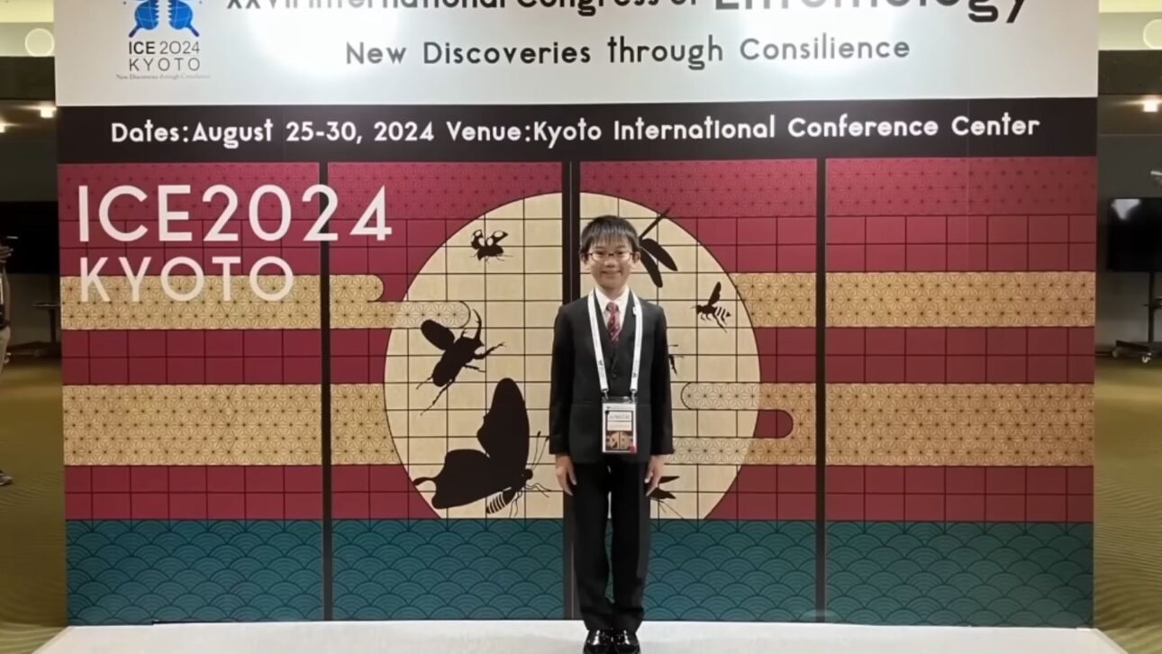 10-year-old boy presents research on memory in butterflies to scientists during international congress.