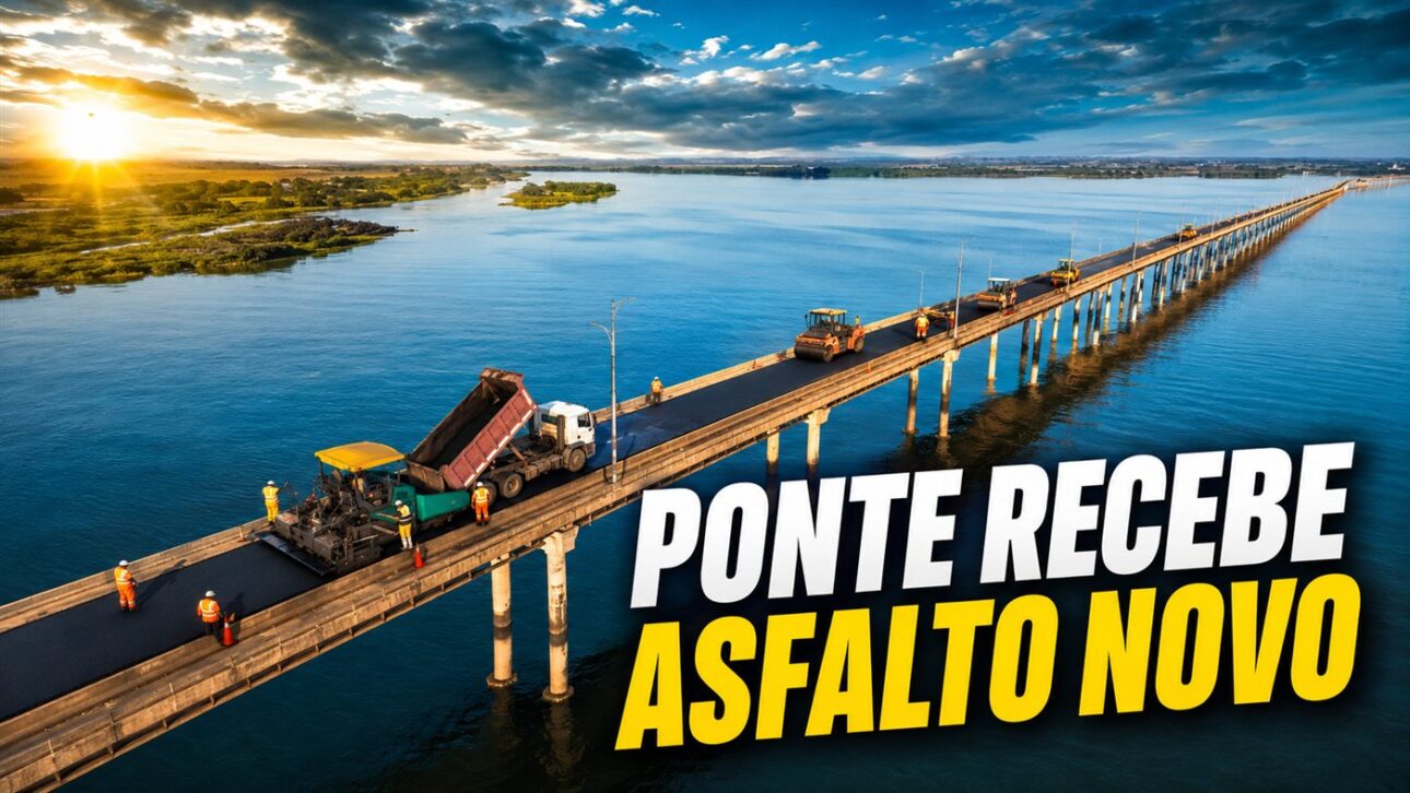 Equipes trabalham no novo pavimento da ponte sobre o rio Paraná durante a obra.