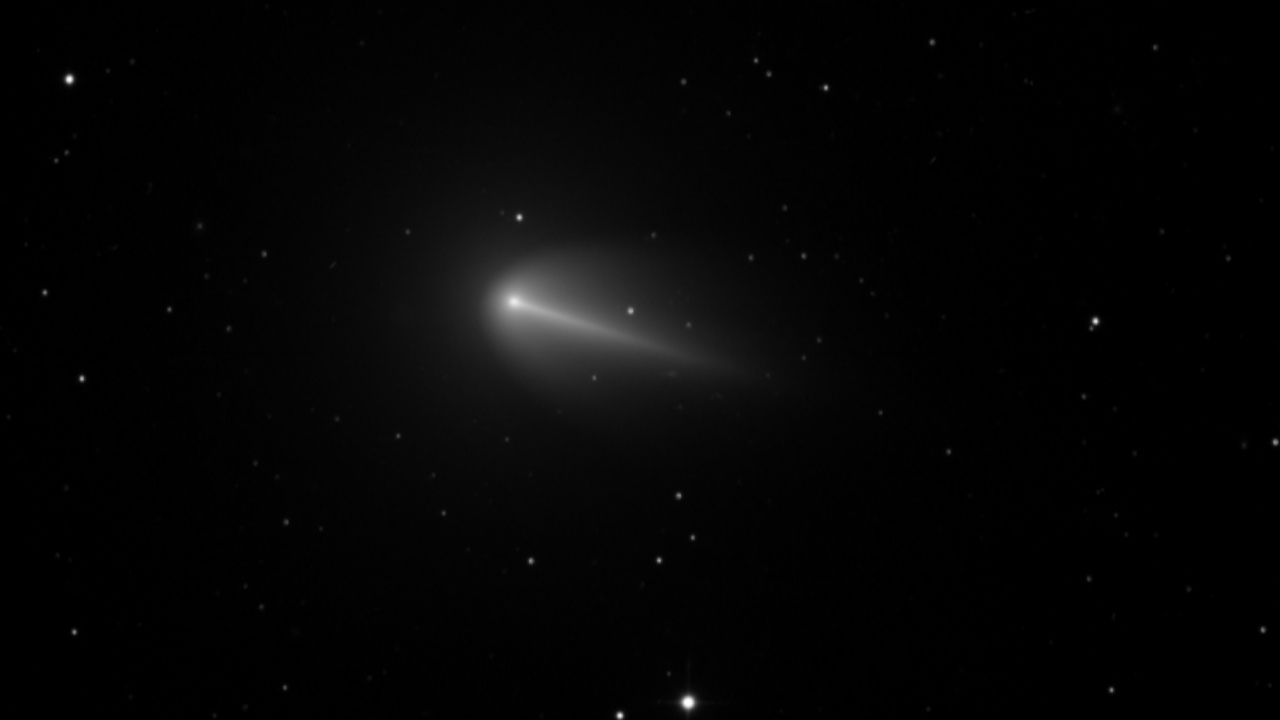 Comet 220P/McNaught shone near the Sun, photographed in Namibia with a green coma, and continues its uncommon activity through the Solar System.